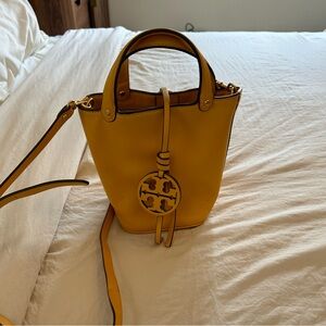 Yellow Tory Burch crossbody bucket bag